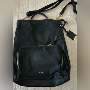 Tumi Black Backpack with Sleek Design and Adjustable Straps